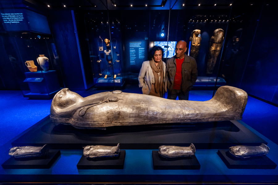 Couple looking at Coffin